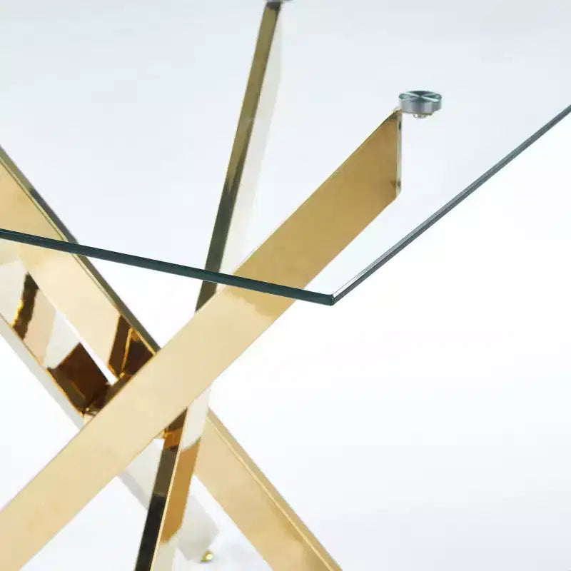 Tavolo da pranzo con gambe incrociate in metallo e piano in vetro temperato, design salvaspazio